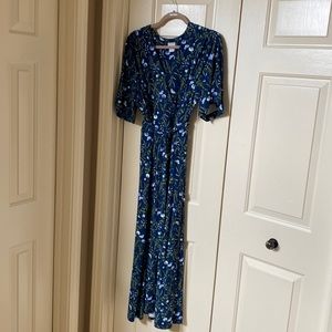 Dark blue wrap dress with light blue flowers. Tie waist, size 2 from Chicos.
